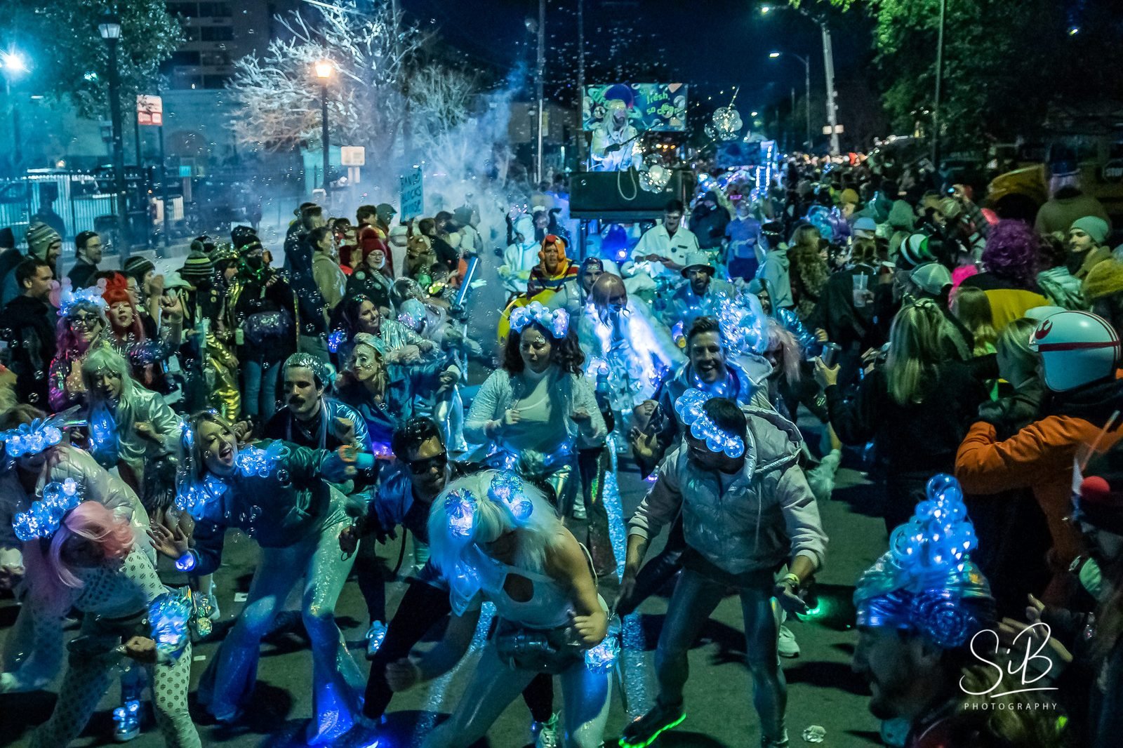 Krewe of Chewbacchus parade, night crowd in motion