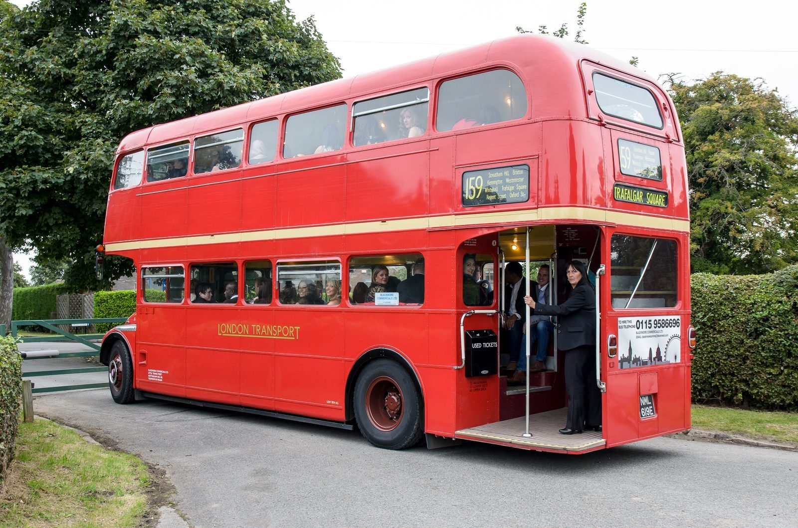 Vintage double-decker bus, outdoor corporate day